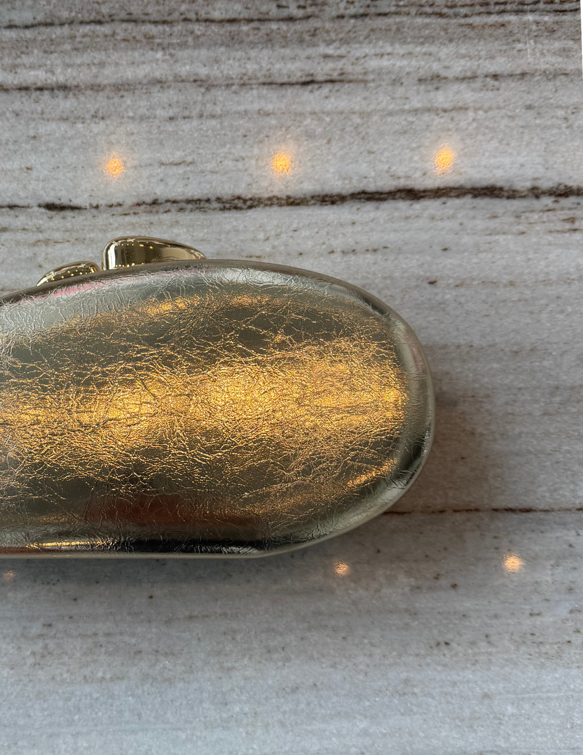 Metallic Oval Clutch — Gold