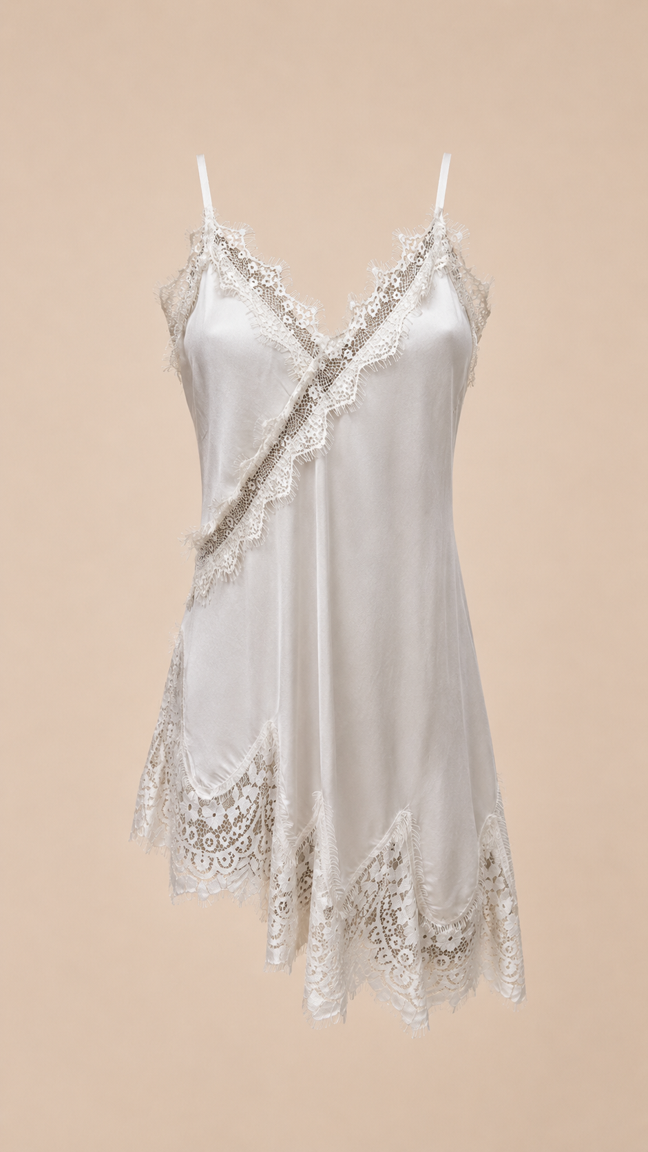 Ivory satin slip dress with eyelash lace trim and scalloped handkerchief hem