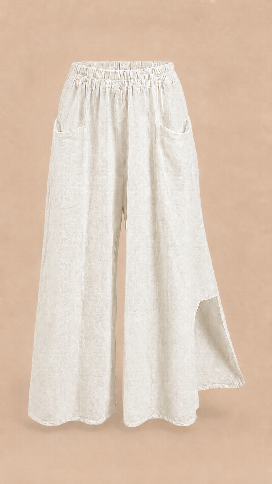 Cream linen wide leg trousers with patch pockets and side slit, front view