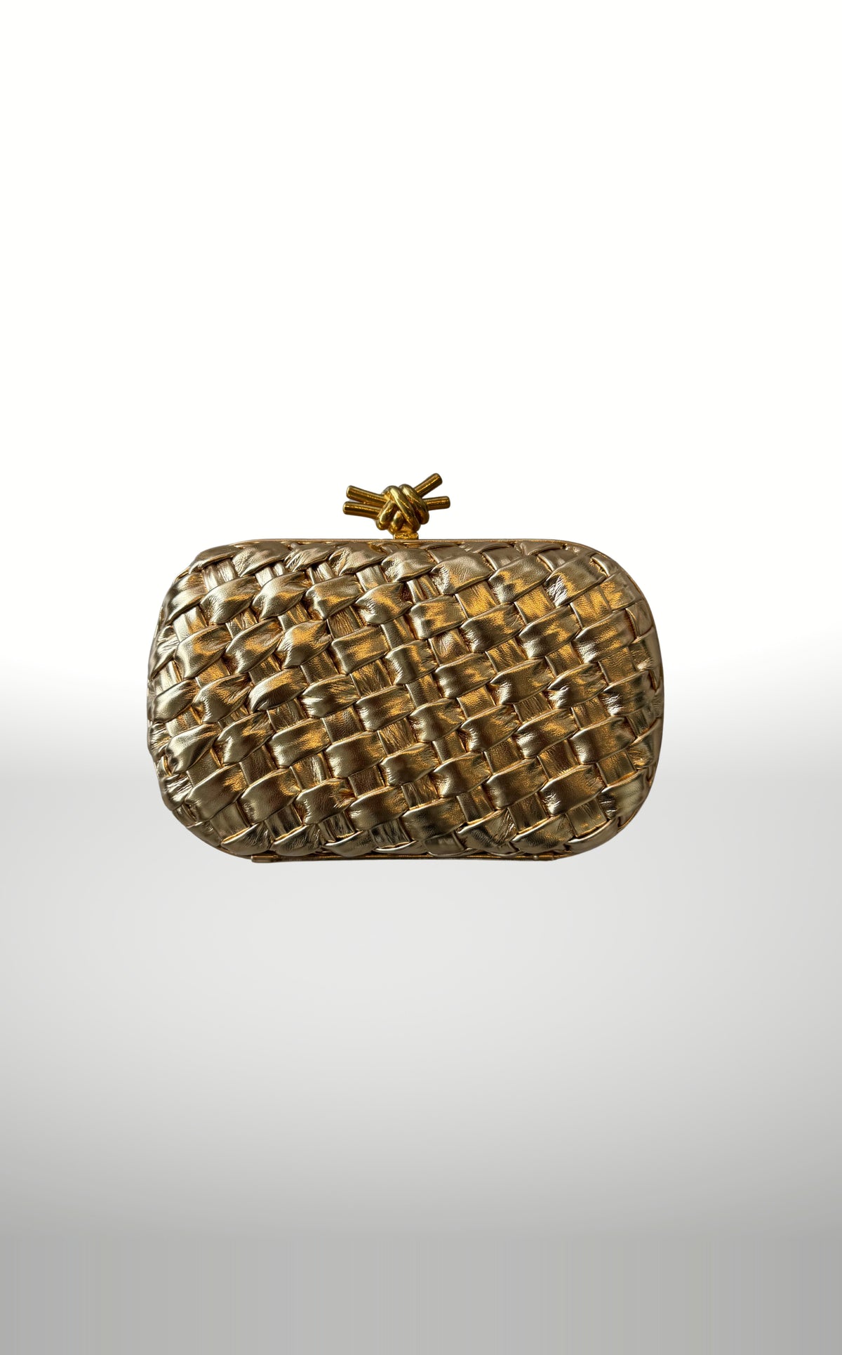 POSH Ateliers woven knot clutch in gold