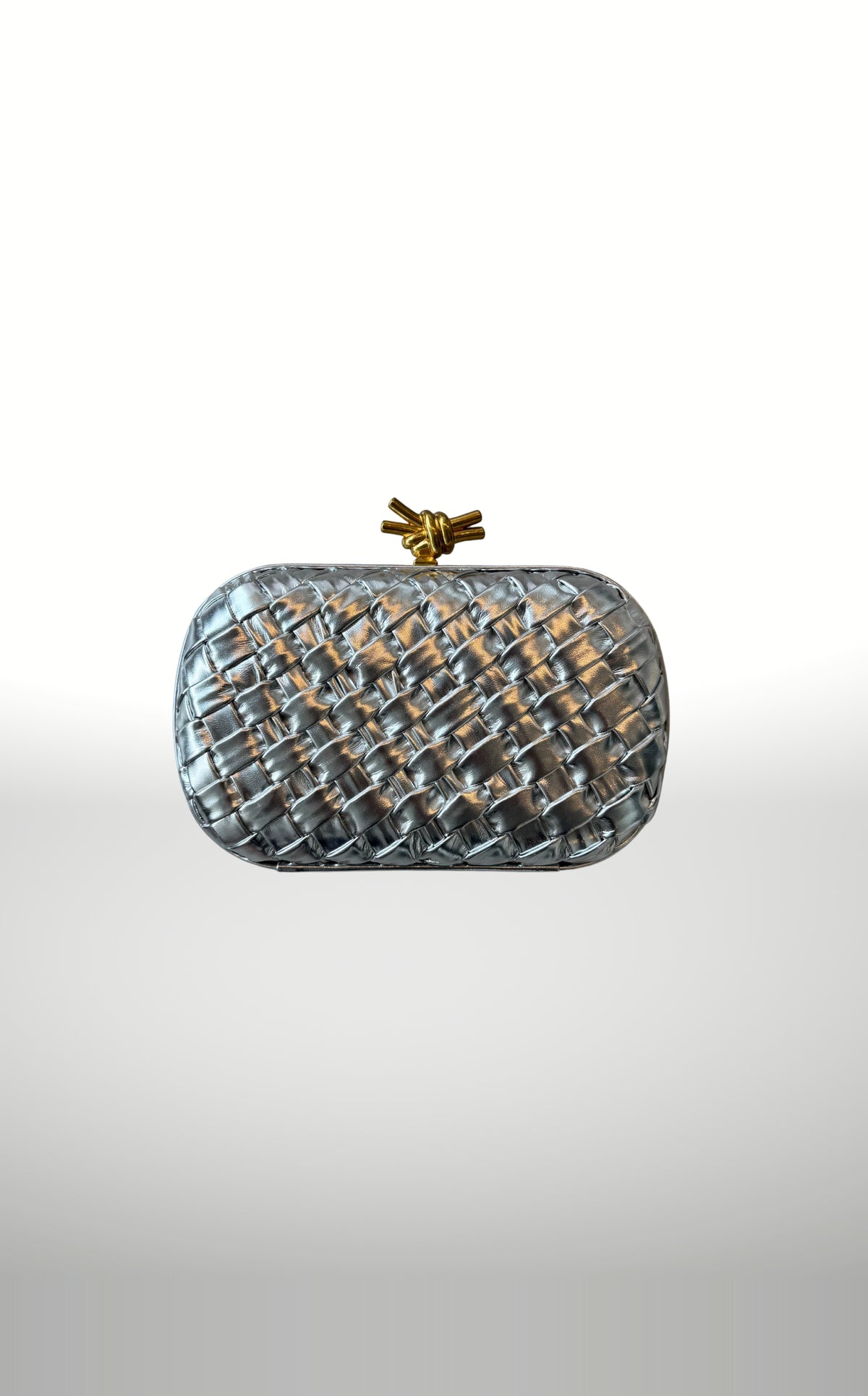 POSH Ateliers woven knot clutch in silver