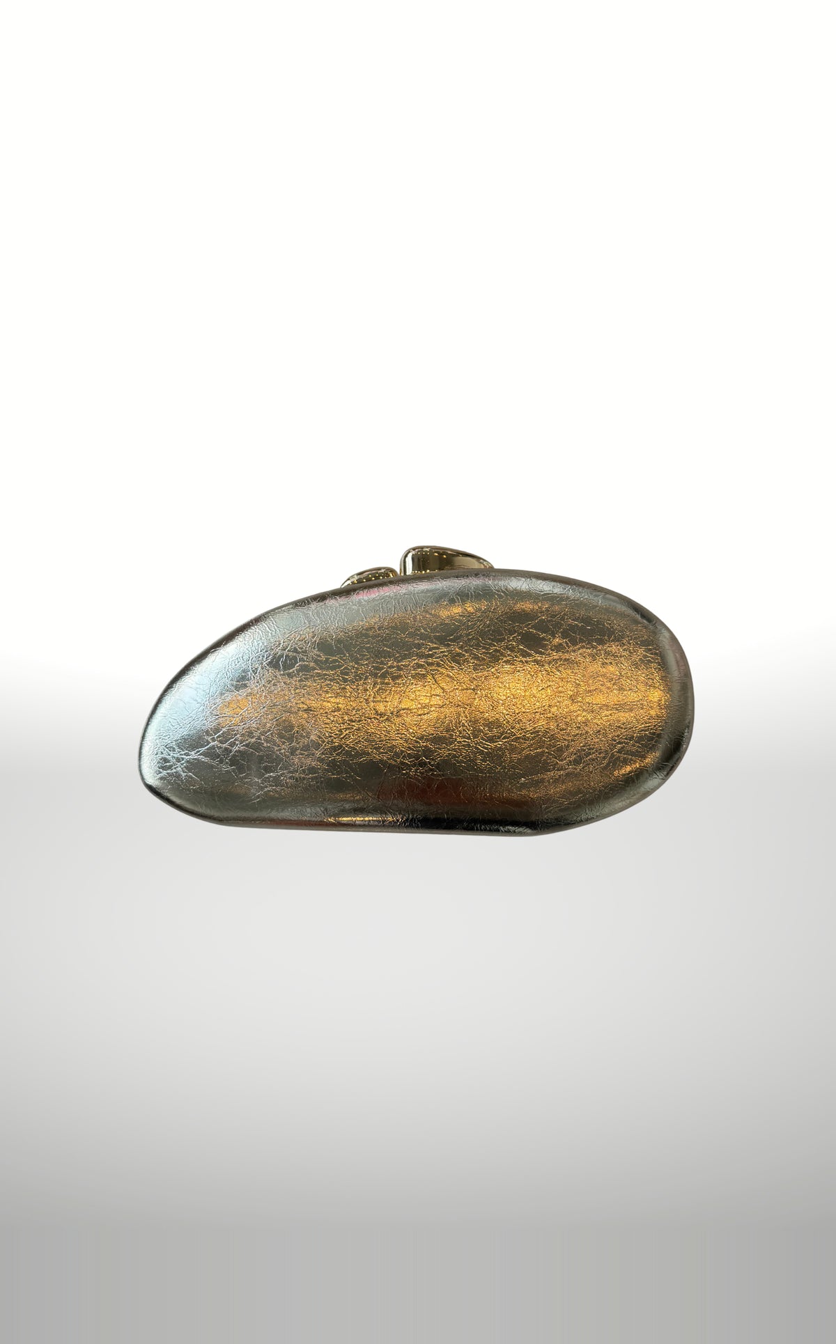 POSH Ateliers metallic oval clutch in gold with stone clasps