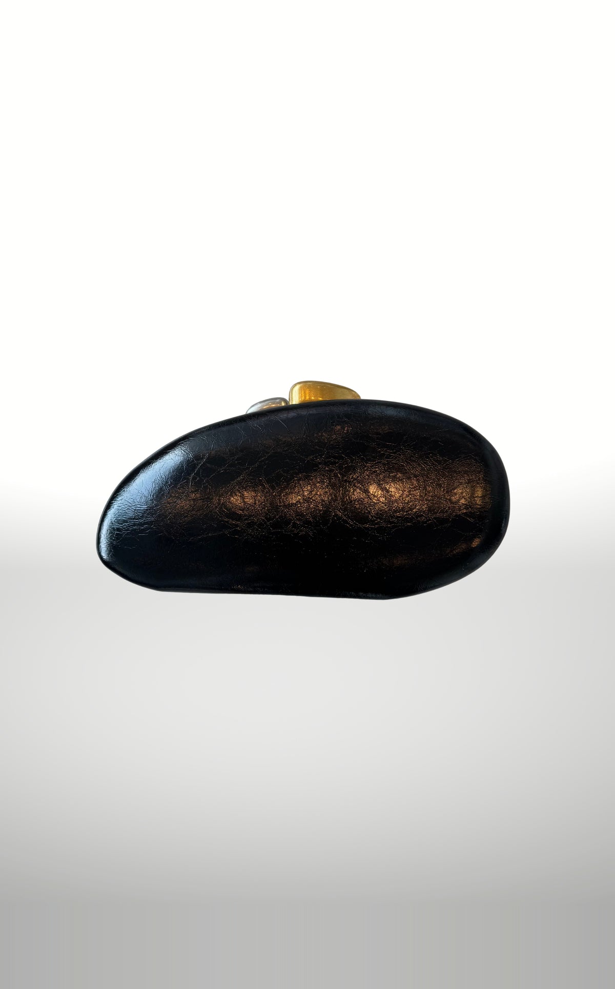 POSH Ateliers metallic oval clutch in black with stone clasps